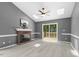Bright living room boasting vaulted ceilings, skylights, and a cozy brick fireplace at 2402 Cynthia Dr, Durham, NC 27704