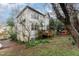 Backyard view of the deck, the yard, and trees around the side of the house at 244 Sweet Bay Pl, Carrboro, NC 27510