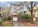 Charming home with purple shutters and a one-car garage and driveway at 244 Sweet Bay Pl, Carrboro, NC 27510