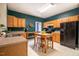 Eat-in kitchen with wood cabinets, ample counter space and modern appliances at 244 Sweet Bay Pl, Carrboro, NC 27510
