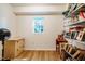 Bright office with a window and lots of storage including bookshelves and a filing cabinet at 244 Sweet Bay Pl, Carrboro, NC 27510