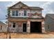 New construction home featuring a two-story design and an attached garage at 251 Bluejay St, Clayton, NC 27520