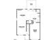 Layout of the first floor featuring a kitchen, living room, dining room, and garage at 256 Bluejay St, Clayton, NC 27520