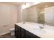 Bright bathroom features a double vanity with a white countertop and modern lighting at 261 White Oak Ridge Dr, Garner, NC 27529