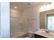 Bathroom featuring a bathtub and vanity with quartz countertop at 261 White Oak Ridge Dr, Garner, NC 27529