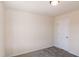 Bedroom featuring neutral walls and carpet with a view of a closed door at 261 White Oak Ridge Dr, Garner, NC 27529