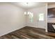 Dining area with wood floors, chandelier, and access to the kitchen at 261 White Oak Ridge Dr, Garner, NC 27529