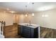 Kitchen island with granite countertop and stainless steel appliances at 261 White Oak Ridge Dr, Garner, NC 27529