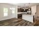 Dining area and kitchen with stainless steel appliances and pendant lighting at 261 White Oak Ridge Dr, Garner, NC 27529