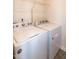Convenient laundry area equipped with modern appliances at 261 White Oak Ridge Dr, Garner, NC 27529