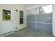 This screened patio offers privacy and a lovely view to the outdoors at 261 White Oak Ridge Dr, Garner, NC 27529