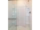 Modern glass enclosed shower with built-in shelving at 261 White Oak Ridge Dr, Garner, NC 27529