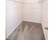 Empty walk-in closet with carpet and wire shelving installed at 261 White Oak Ridge Dr, Garner, NC 27529