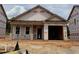 This is the exterior of a house under construction with an attached two car garage at 262 Bluejay St, Clayton, NC 27520
