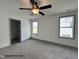 New bedroom featuring grey trim and carpet at 263 Bluejay St, Clayton, NC 27520