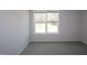Cozy, well-lit bedroom with neutral carpet, and a serene ambiance at 3020 Freewinds Way # 47, Cary, NC 27519
