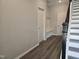 Bright entryway with practical storage, bench, and durable wood-look flooring at 3020 Freewinds Way # 47, Cary, NC 27519