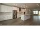 Beautiful kitchen featuring an island, white cabinets, and stainless steel appliances at 3020 Freewinds Way # 47, Cary, NC 27519