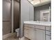 Bathroom with textured walls, tiled floors and a walk in shower at 312 Troon Village Ln, Cary, NC 27511
