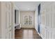 Bright home office with built-in desk, cabinets, storage, and a window with a view at 312 Troon Village Ln, Cary, NC 27511