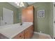 Bathroom featuring a vanity with drawers and a rectangular mirror above the sink at 321 Nortwick Rd, Rolesville, NC 27571