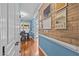 Hallway with wood-look flooring and storage space to the left of the doorway at 321 Nortwick Rd, Rolesville, NC 27571