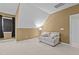 Relax in this light-filled sitting area with a soft couch, neutral colors, and an inviting atmosphere for quiet relaxation at 321 Nortwick Rd, Rolesville, NC 27571