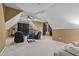 Cozy living space with reclining chairs, a media center with a large television, and neutral carpeting at 321 Nortwick Rd, Rolesville, NC 27571
