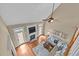 Spacious living room with a cozy fireplace and access to the outdoor area at 321 Nortwick Rd, Rolesville, NC 27571