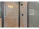 Walk-in shower with tile surround and glass door, offering a spa-like experience at 321 Nortwick Rd, Rolesville, NC 27571