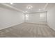 Bright, carpeted room with ample natural light at 3231 Pelican Ln, Durham, NC 27703