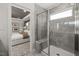 Bathroom featuring a frameless glass shower and an adjacent main bedroom at 3233 Pelican Ln, Durham, NC 27703