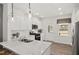 Modern kitchen features granite countertops, stainless steel appliances, and a subway tile backsplash at 3233 Pelican Ln, Durham, NC 27703