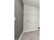 Functional laundry room with tile floors, ample wall space, and hookups for laundry appliances at 3233 Pelican Ln, Durham, NC 27703