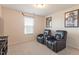 Bedroom with two leather chairs and tv at 3422 Norway Spruce Rd, Raleigh, NC 27616