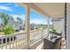 Inviting front porch with comfortable seating and a view of the neighborhood at 3422 Norway Spruce Rd, Raleigh, NC 27616