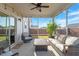 Cozy screened-in porch with comfortable furniture and outdoor lighting, creating a relaxing atmosphere at 3422 Norway Spruce Rd, Raleigh, NC 27616