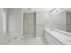 Spacious bathroom featuring a double vanity, a soaking tub, and a separate shower area at 3519 Streams Of Fields Dr, Raleigh, NC 27604