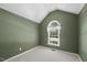 Bright bedroom with vaulted ceilings, a large window, and neutral carpeting at 3519 Streams Of Fields Dr, Raleigh, NC 27604