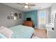 Bedroom with decorative wall hangings, ceiling fan and natural light at 3805 Euliss Rd, Burlington, NC 27215