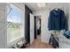 Walk-in closet with a window, shelving and closet rod with organized storage at 3805 Euliss Rd, Burlington, NC 27215