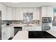 Updated kitchen featuring quartz counters, updated appliances, and a tile backsplash at 3805 Euliss Rd, Burlington, NC 27215