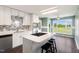 Bright kitchen features modern appliances, a breakfast bar, and a large window at 3805 Euliss Rd, Burlington, NC 27215