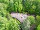 Aerial view of property in a densely wooded area at 3915 Nottaway Rd, Durham, NC 27707