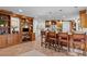 Open kitchen design featuring built-in desk, wood cabinets, stainless steel appliances, and kitchen island at 3915 Nottaway Rd, Durham, NC 27707