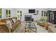 Comfortable living room featuring a fireplace, neutral decor, and views of the outdoors at 3915 Nottaway Rd, Durham, NC 27707