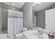 Bathroom featuring a white vanity, bathtub, shower and a white toilet at 402 Troycott Pl, Cary, NC 27519