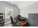 Office space with ergonomic desk and comfortable chair, offering a practical workspace at 402 Troycott Pl, Cary, NC 27519