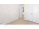 Bedroom with neutral carpet and an open door at 404 Ember St, Sanford, NC 27330