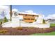Galvins Ridge community entrance sign with white brick and wooden accents at 404 Ember St, Sanford, NC 27330